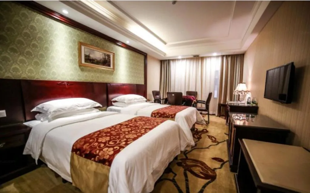 Bed in Vienna Hotel Hengyang Zhengxiang District Nanhua University