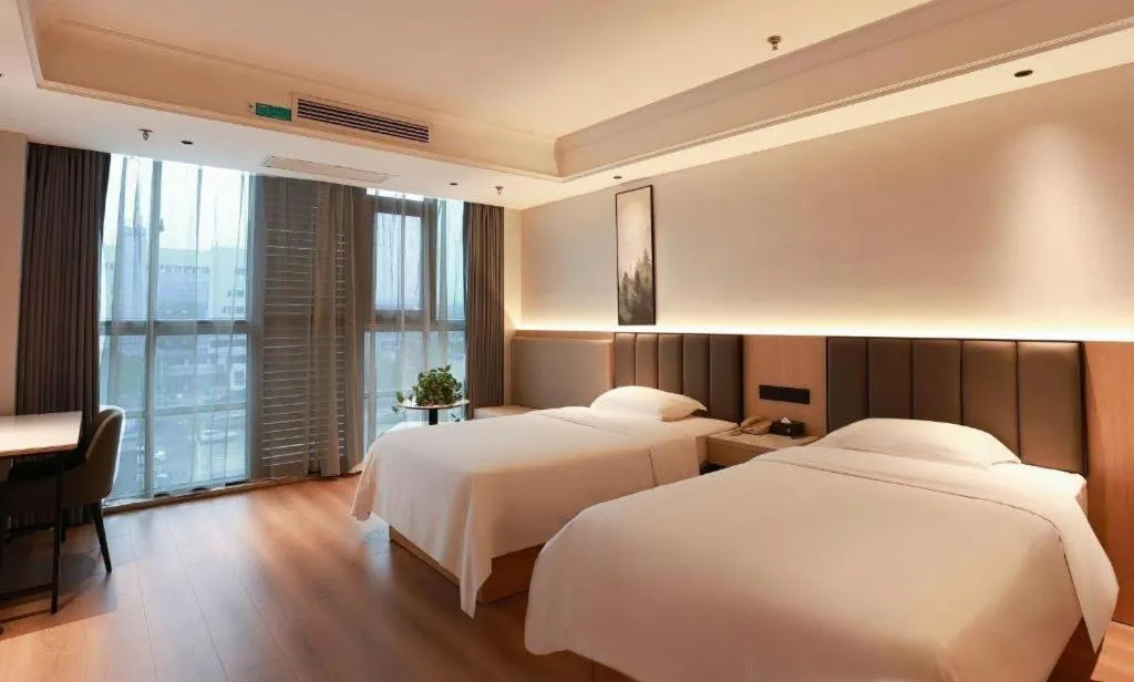 Bed in GreenTree Inn Maanshan Hanshan District Jiuwu Square Hotel