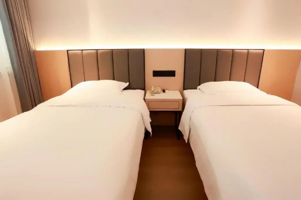 Bed in GreenTree Inn Maanshan Hanshan District Jiuwu Square Hotel