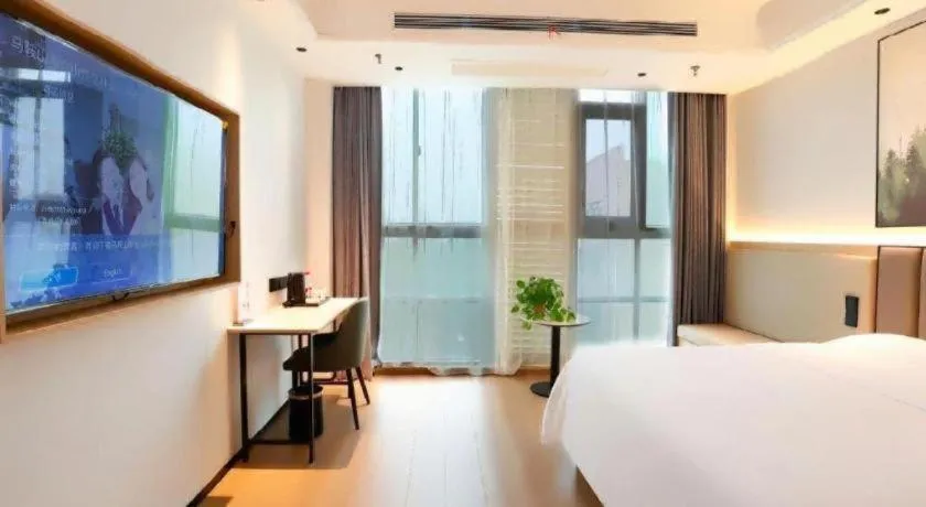 Bed in GreenTree Inn Maanshan Hanshan District Jiuwu Square Hotel
