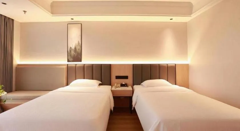 Bed in GreenTree Inn Maanshan Hanshan District Jiuwu Square Hotel