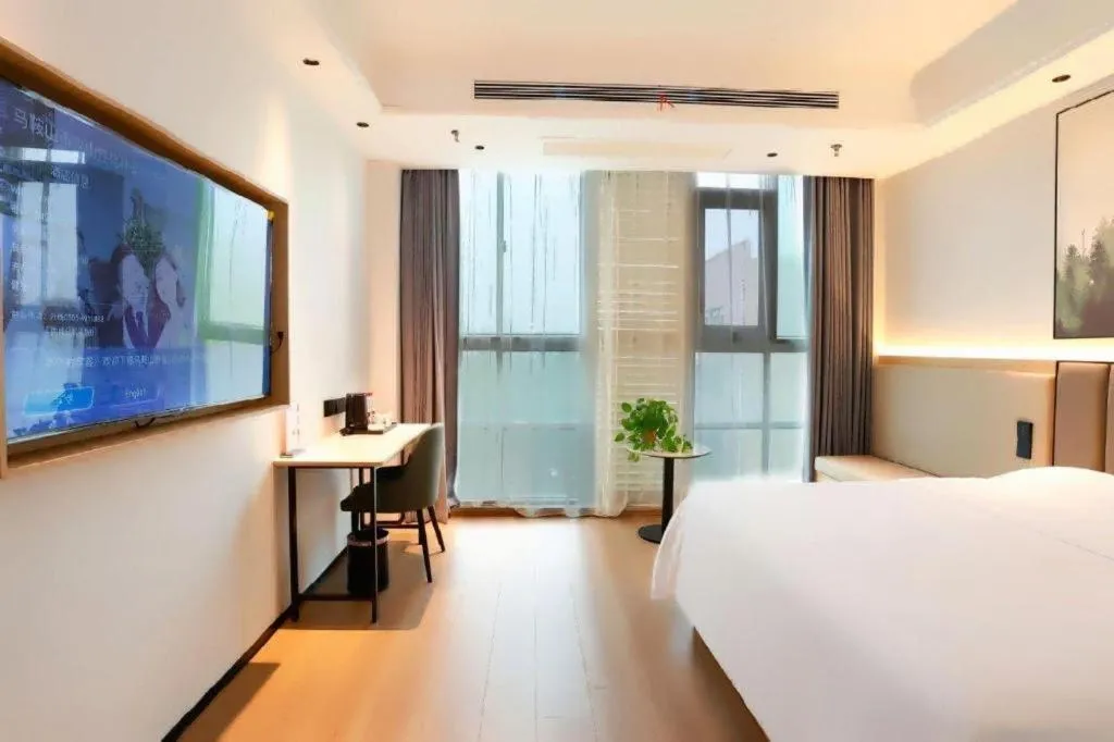Bed in GreenTree Inn Maanshan Hanshan District Jiuwu Square Hotel