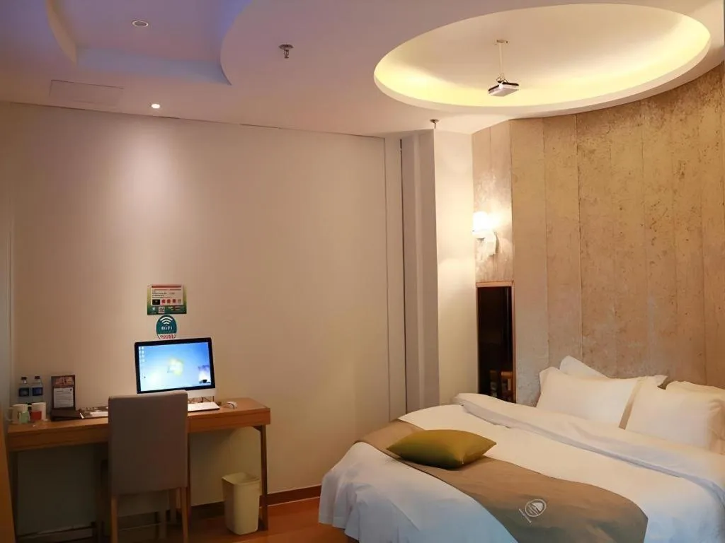 Bed in GreenTree Inn Maanshan Hanshan District Jiuwu Square Hotel