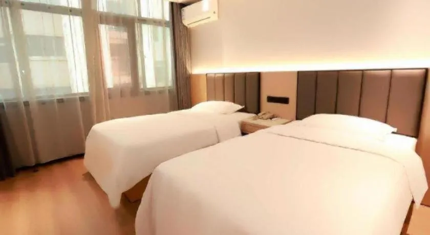 Bed in GreenTree Inn Maanshan Hanshan District Jiuwu Square Hotel