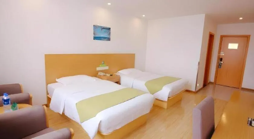 Bed in GreenTree Alliance Suzhou Zhangjiagang Nanfeng Town Hotel