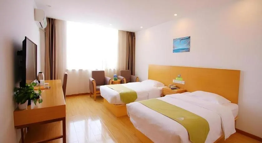 Bed in GreenTree Alliance Suzhou Zhangjiagang Nanfeng Town Hotel