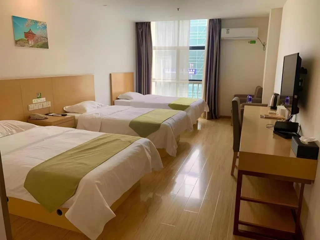 Bed in GreenTree Alliance Suzhou Zhangjiagang Nanfeng Town Hotel