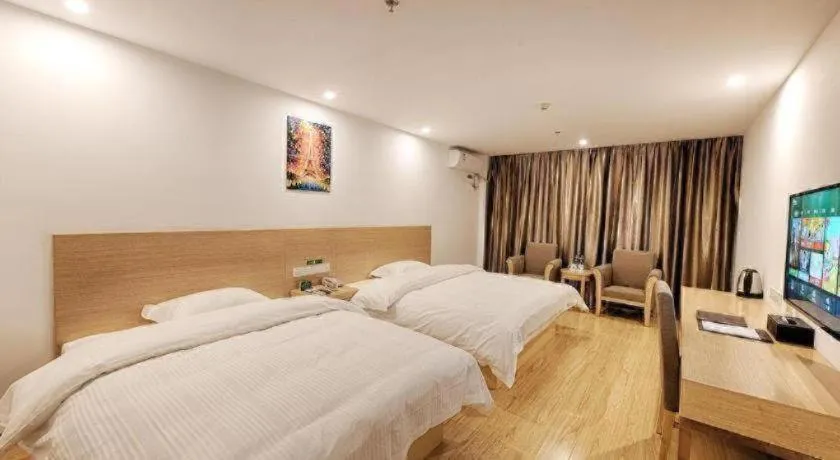 Bed in GreenTree Alliance Suzhou Zhangjiagang Nanfeng Town Hotel