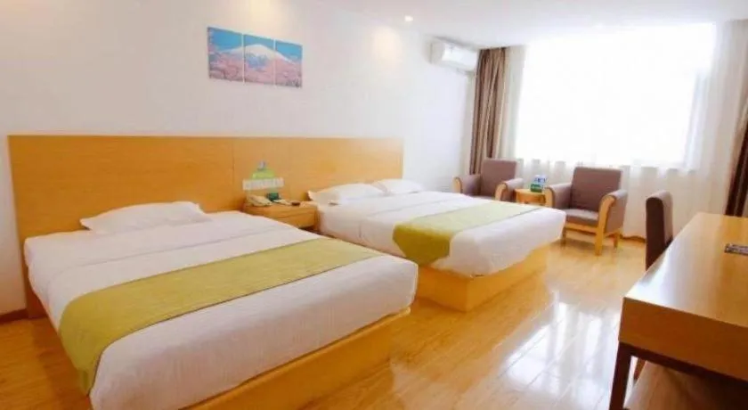 Bed in GreenTree Alliance Suzhou Zhangjiagang Nanfeng Town Hotel