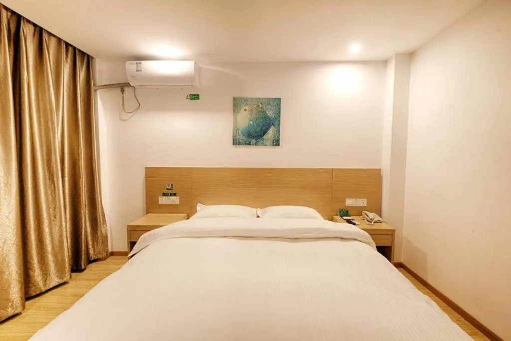 Bed in GreenTree Alliance Suzhou Zhangjiagang Nanfeng Town Hotel