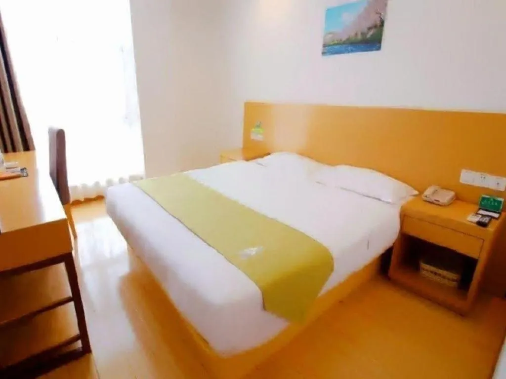 Bed in GreenTree Alliance Suzhou Zhangjiagang Nanfeng Town Hotel