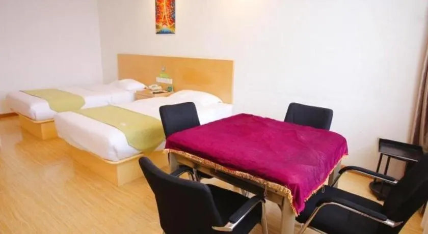 Bed in GreenTree Alliance Suzhou Zhangjiagang Nanfeng Town Hotel