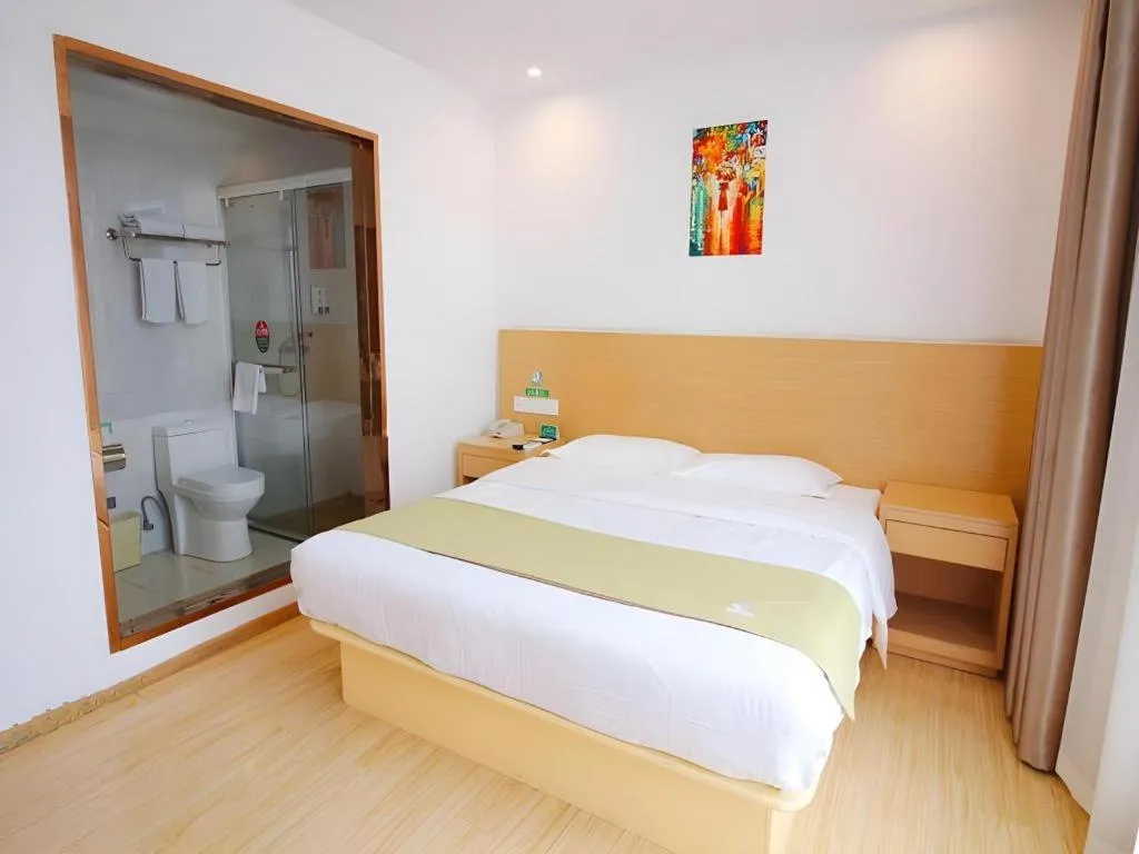 Bed in GreenTree Alliance Suzhou Zhangjiagang Nanfeng Town Hotel