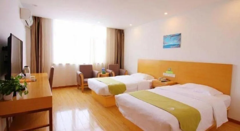 Bed in GreenTree Alliance Suzhou Zhangjiagang Nanfeng Town Hotel