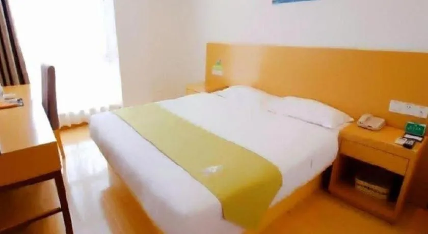 Bed in GreenTree Alliance Suzhou Zhangjiagang Nanfeng Town Hotel