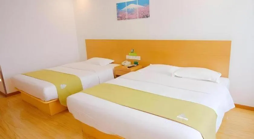 Bed in GreenTree Alliance Suzhou Zhangjiagang Nanfeng Town Hotel
