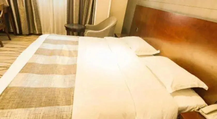 Bed in GreenTree Alliance Disneyland North Gate Bed in GreenTree Alliance Disneyland North Gate