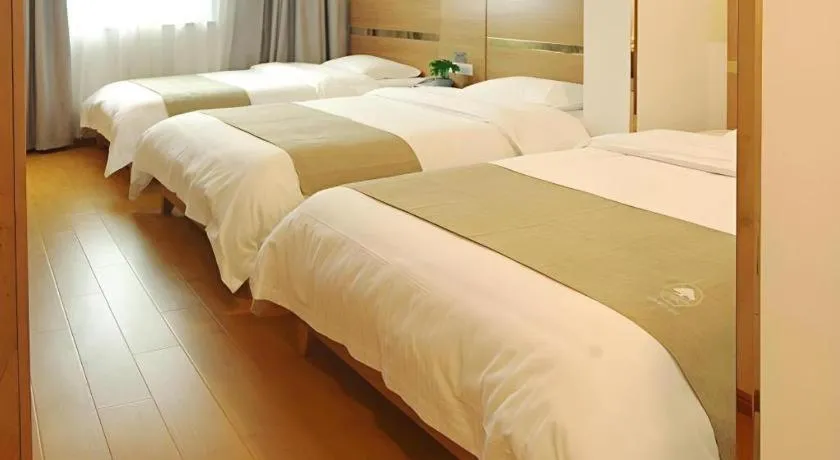 Bed in GreenTree Inn Fuzhou Eastern Capital Express Hotel