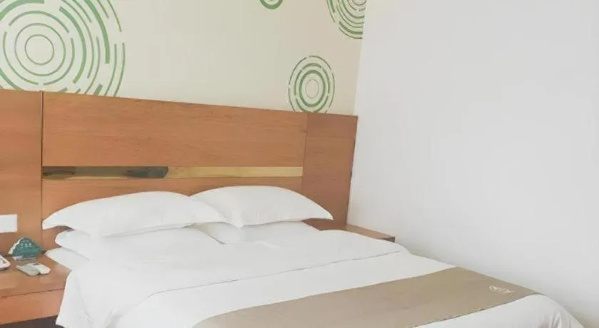 Bed in GreenTree Inn Fuzhou Eastern Capital Express Hotel