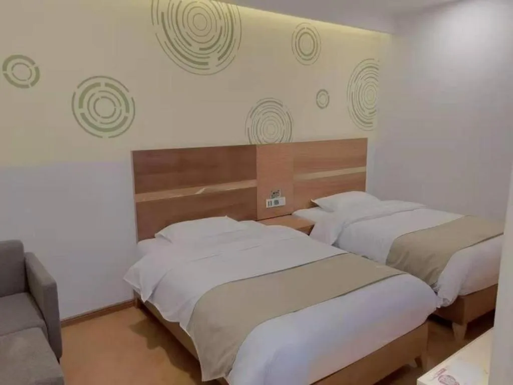 Bed in GreenTree Inn Fuzhou Eastern Capital Express Hotel