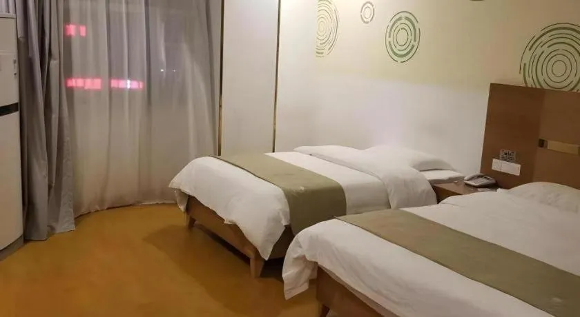 Bed in GreenTree Inn Fuzhou Eastern Capital Express Hotel