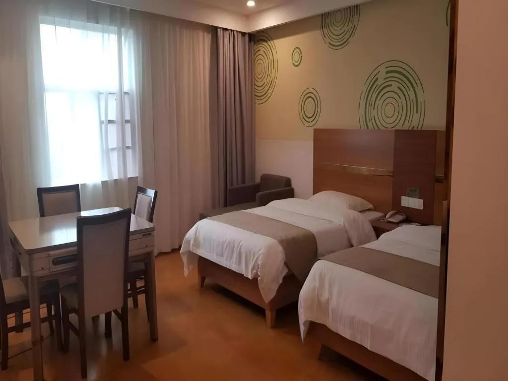 Bed in GreenTree Inn Fuzhou Eastern Capital Express Hotel