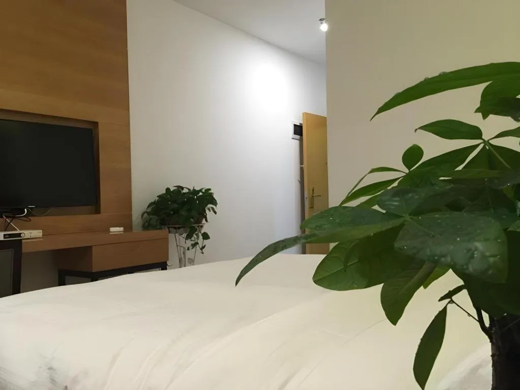 Bed in GreenTree Inn Fuzhou Eastern Capital Express Hotel