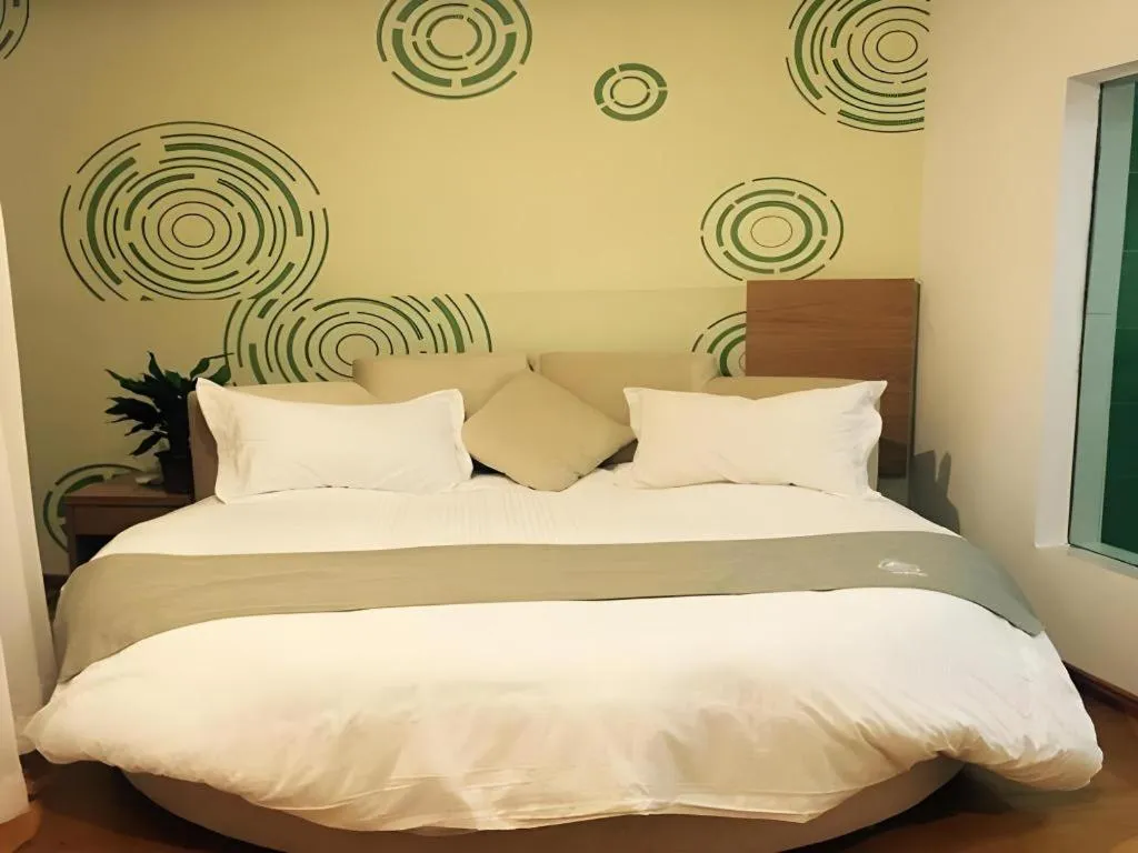 Bed in GreenTree Inn Fuzhou Eastern Capital Express Hotel