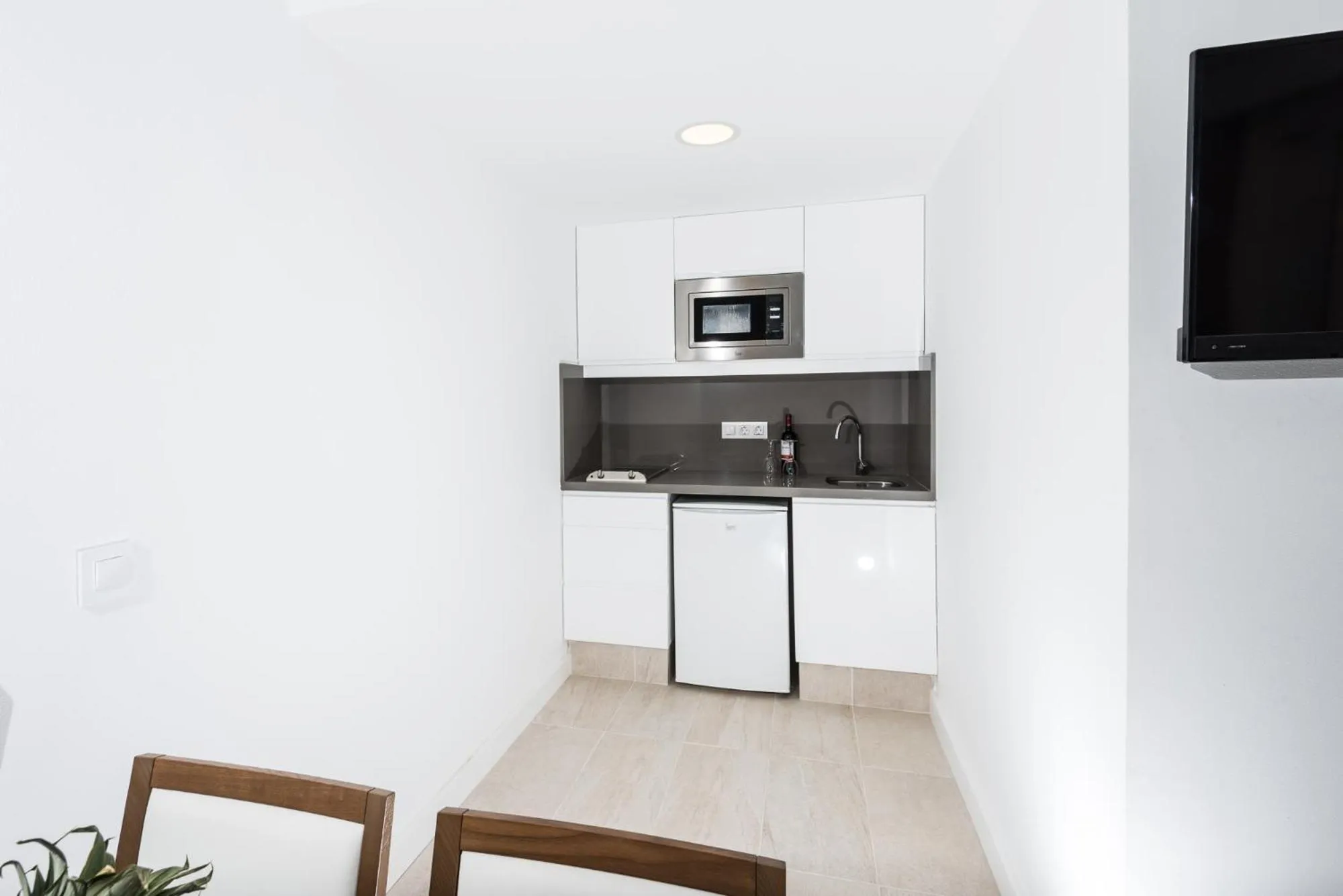 Living room, Kitchen/Kitchenette in Apartamentos Menorcamar