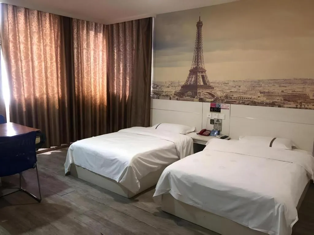 Bed in JUNYI Hotel Jiangxi Xinyu Baoshi Park