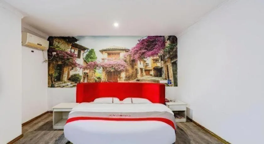 Bed in JUNYI Hotel Jiangxi Xinyu Baoshi Park