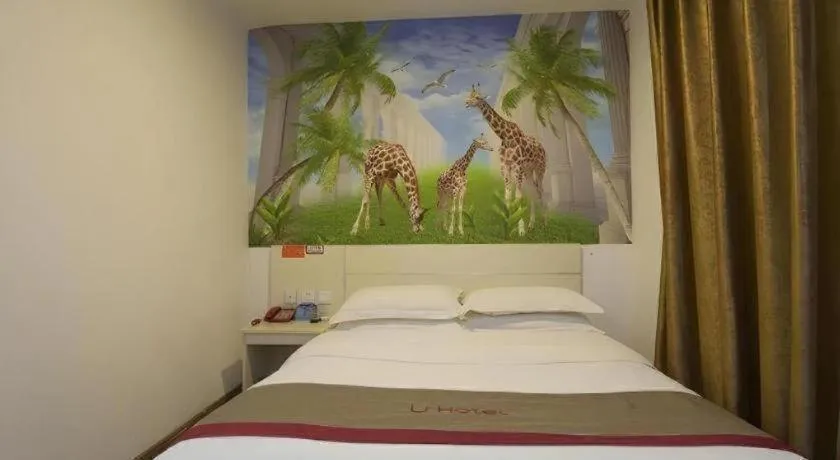 Bed in JUNYI Hotel Jiangxi Xinyu Baoshi Park