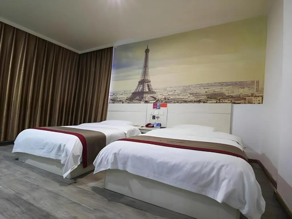 Bed in JUNYI Hotel Jiangxi Xinyu Baoshi Park