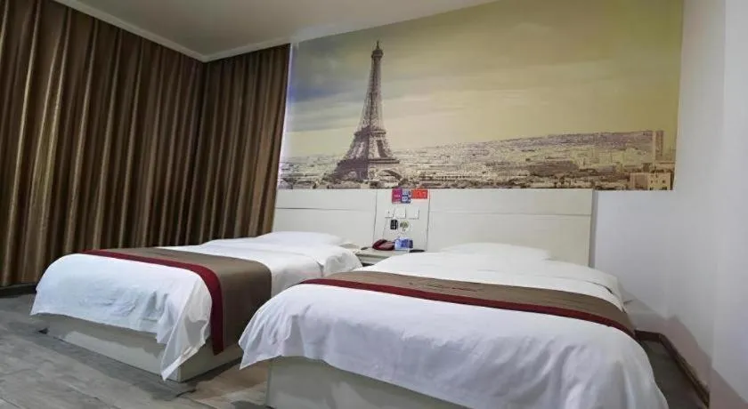 Bed in JUNYI Hotel Jiangxi Xinyu Baoshi Park