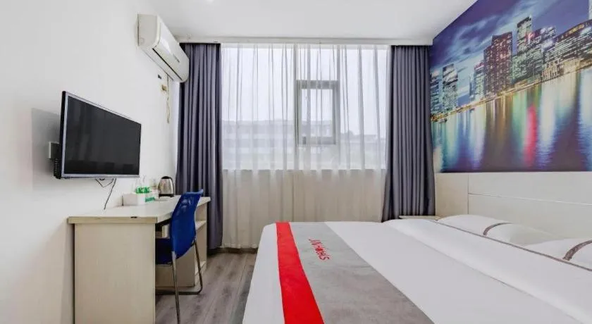 Bed in JUNYI Hotel Jiangxi Xinyu Baoshi Park