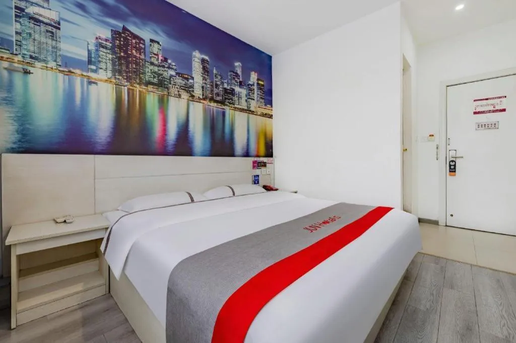 Bed in JUNYI Hotel Jiangxi Xinyu Baoshi Park