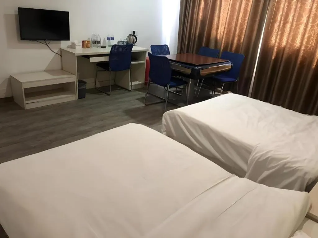 Bed in JUNYI Hotel Jiangxi Xinyu Baoshi Park