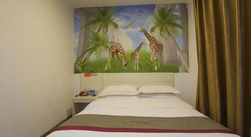 Bed in JUNYI Hotel Jiangxi Xinyu Baoshi Park