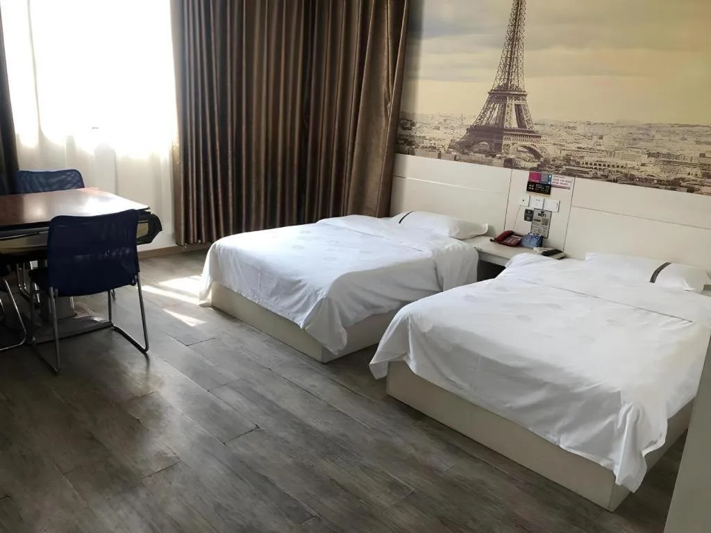 Bed in JUNYI Hotel Jiangxi Xinyu Baoshi Park