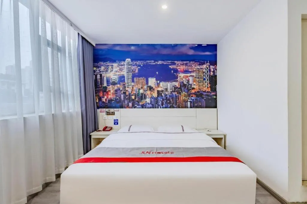 Bed in JUNYI Hotel Jiangxi Xinyu Baoshi Park