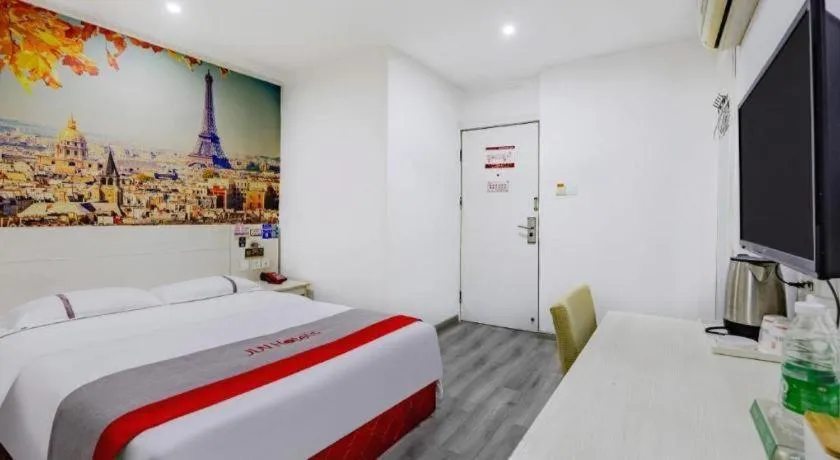 Bed in JUNYI Hotel Jiangxi Xinyu Baoshi Park