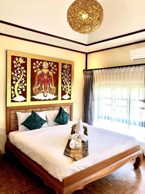 Bed in Chang Kaew Resort Chiang Mai