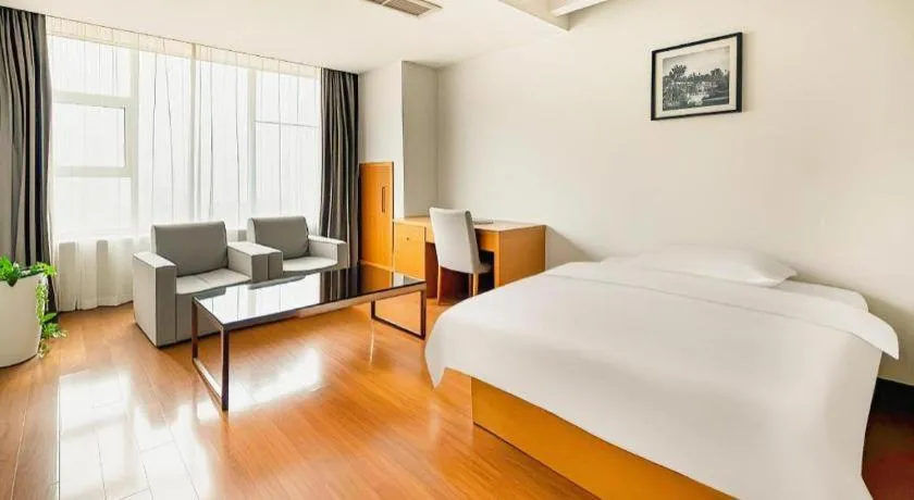 Bed in GreenTree Inn Ningbo Hangzhou Wan New District Lishi Square Business Hotel