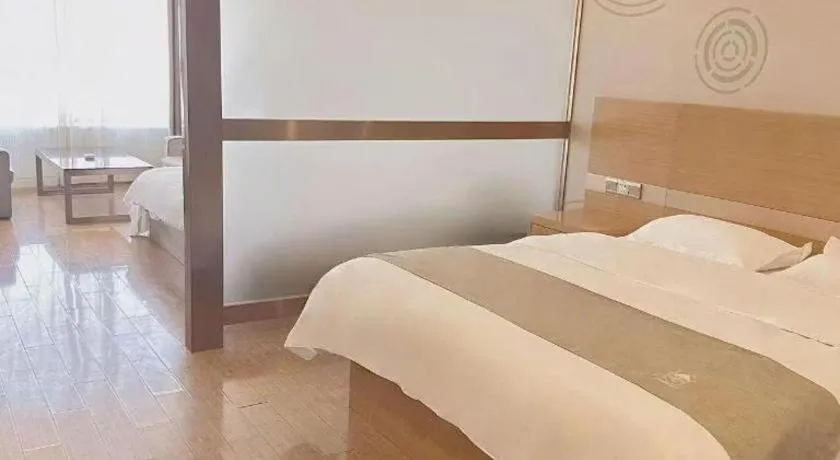 Bed in GreenTree Inn Ningbo Hangzhou Wan New District Lishi Square Business Hotel