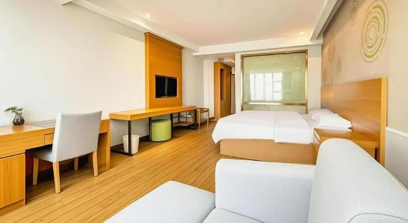 Bed in GreenTree Inn Ningbo Hangzhou Wan New District Lishi Square Business Hotel