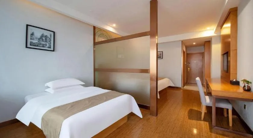 Bed in GreenTree Inn Ningbo Hangzhou Wan New District Lishi Square Business Hotel