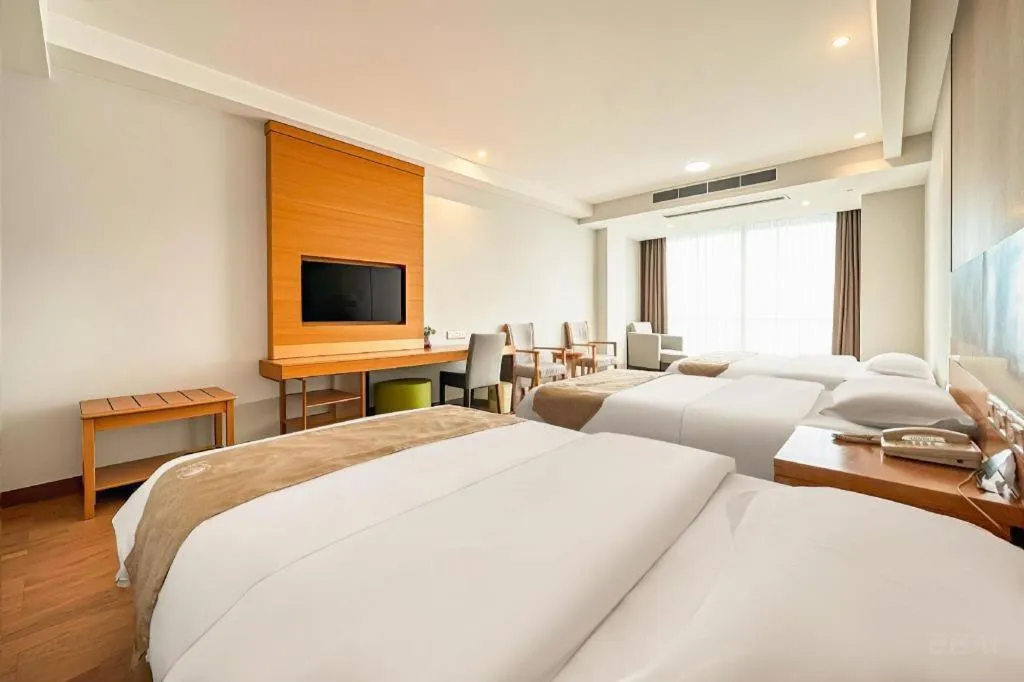 Bed in GreenTree Inn Ningbo Hangzhou Wan New District Lishi Square Business Hotel