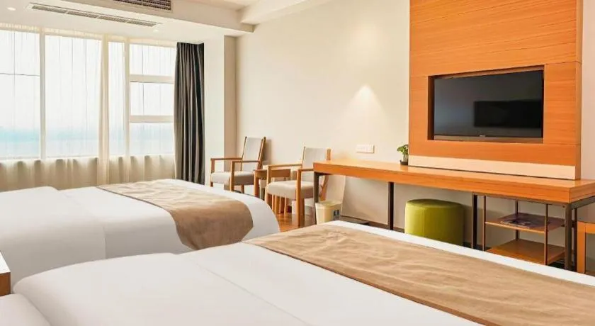 Bed in GreenTree Inn Ningbo Hangzhou Wan New District Lishi Square Business Hotel
