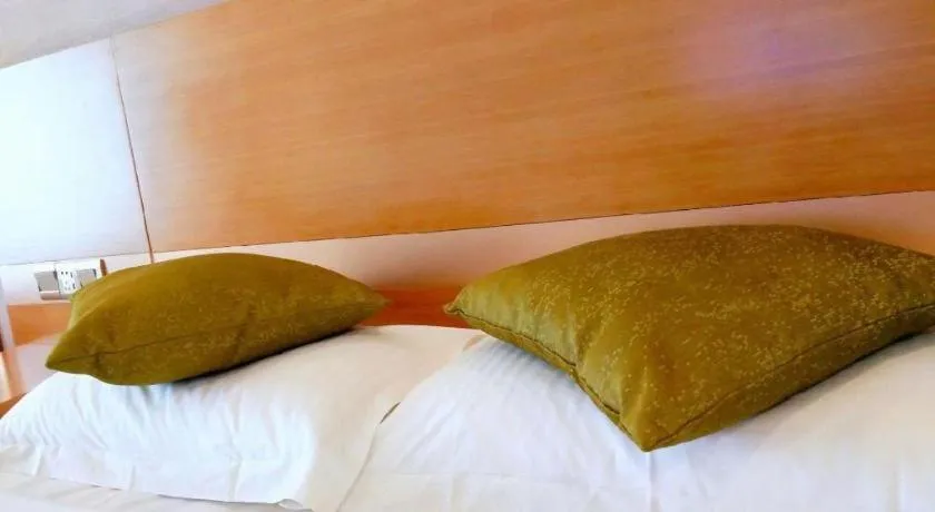 Bed in GreenTree Inn Ningbo Hangzhou Wan New District Lishi Square Business Hotel