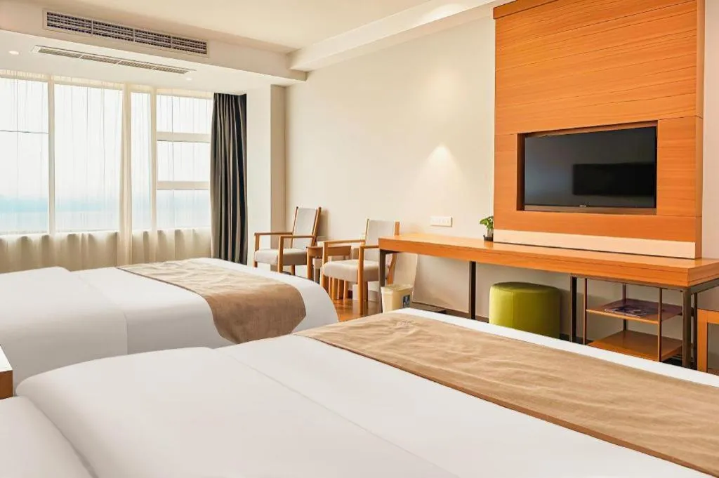 Bed in GreenTree Inn Ningbo Hangzhou Wan New District Lishi Square Business Hotel